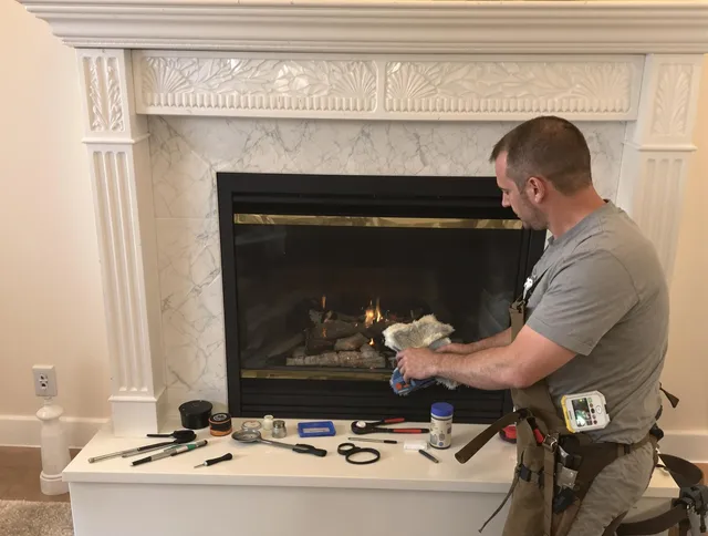 West Palm Beach Chimney Sweep performing fireplace maintenance in West Palm Beach, FL